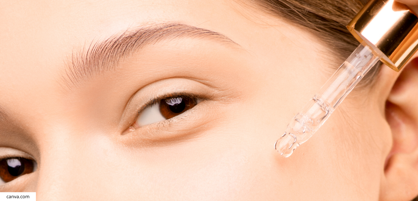 woman applying serum